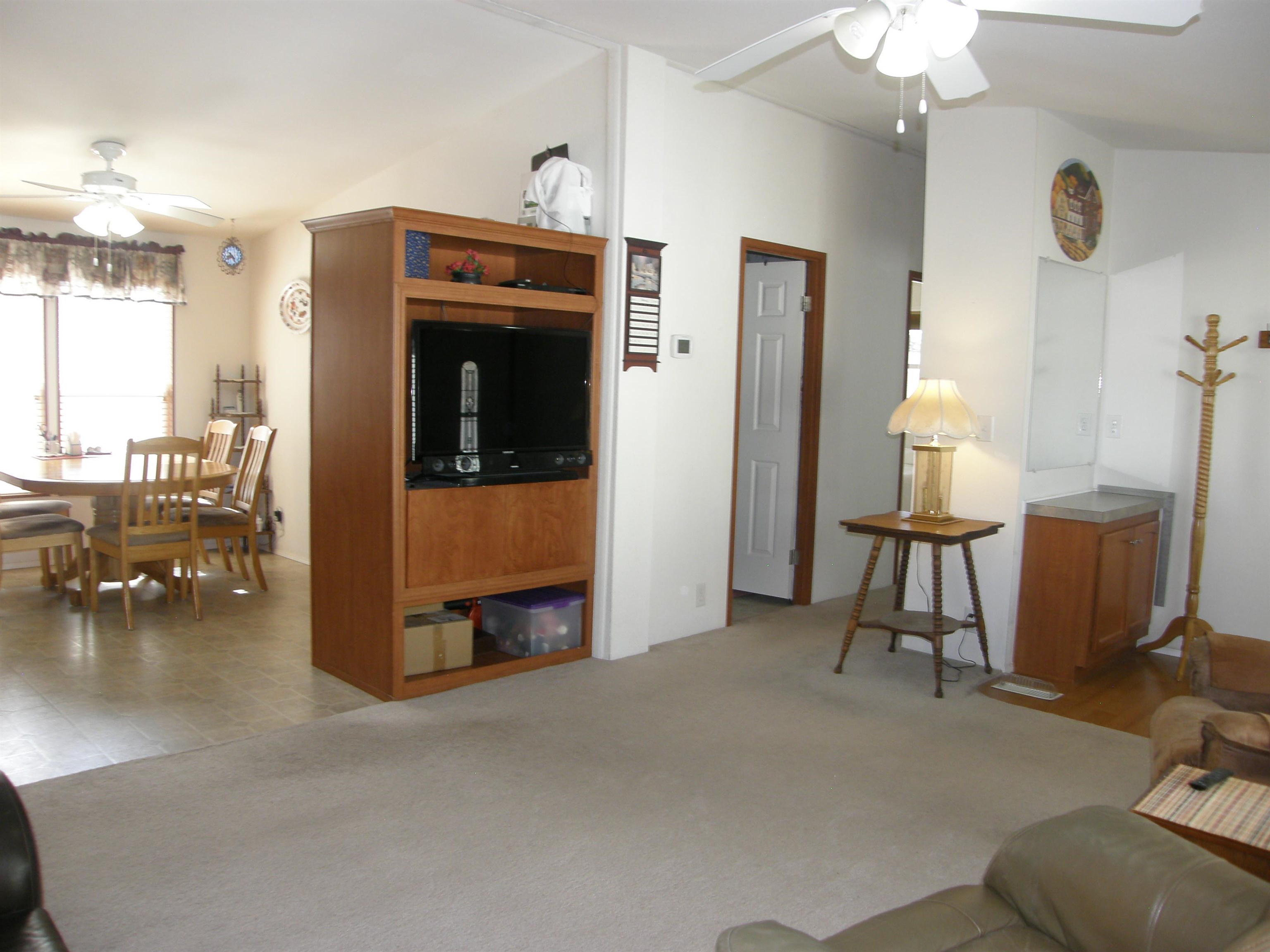 435 32 Road, Unit 262 Clifton, CO 81520 - Photo 13 of 42 a view of a livingroom with furniture and a fireplace