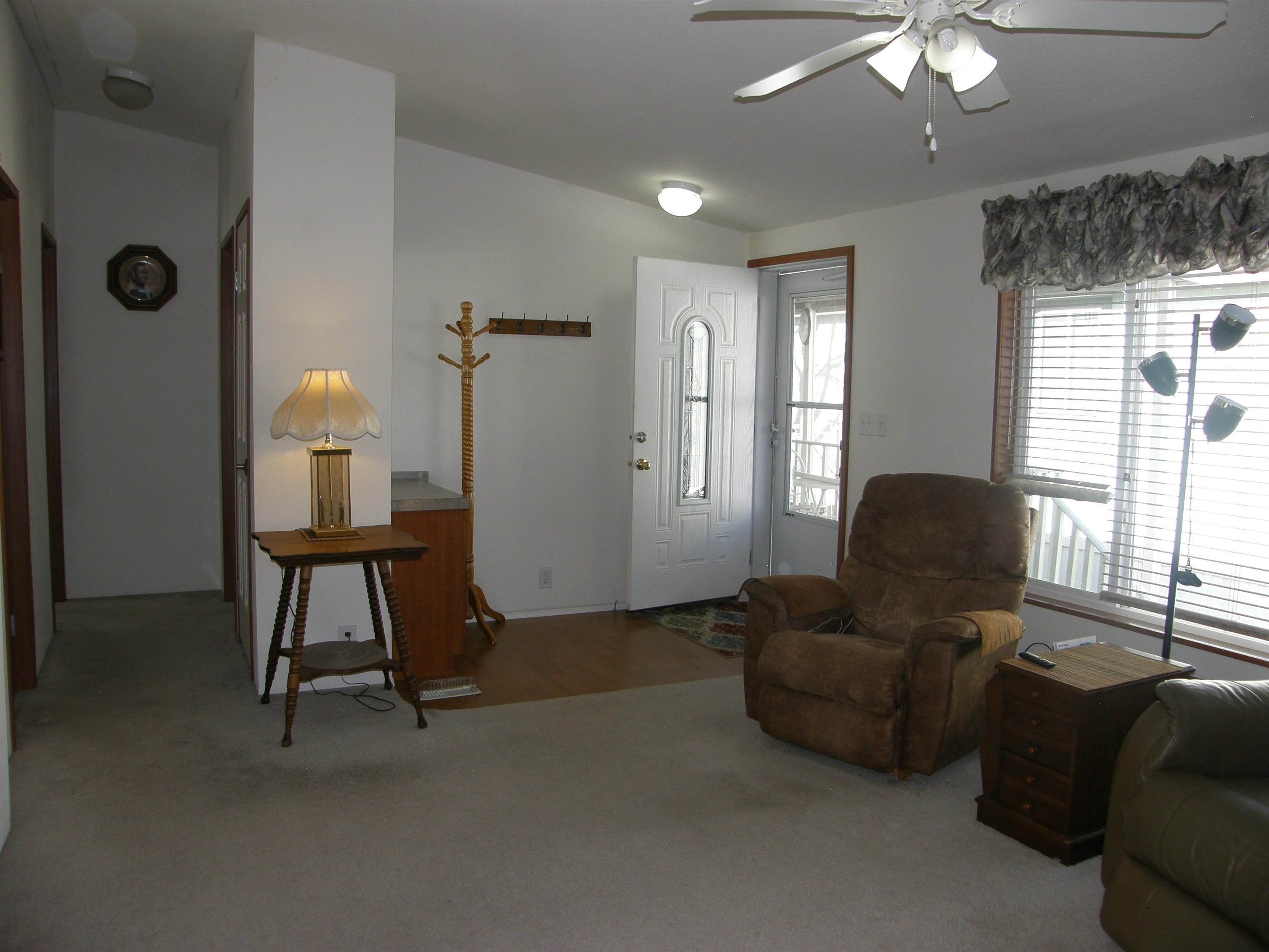 435 32 Road, Unit 262 Clifton, CO 81520 - Photo 14 of 42 a living room with furniture and a window