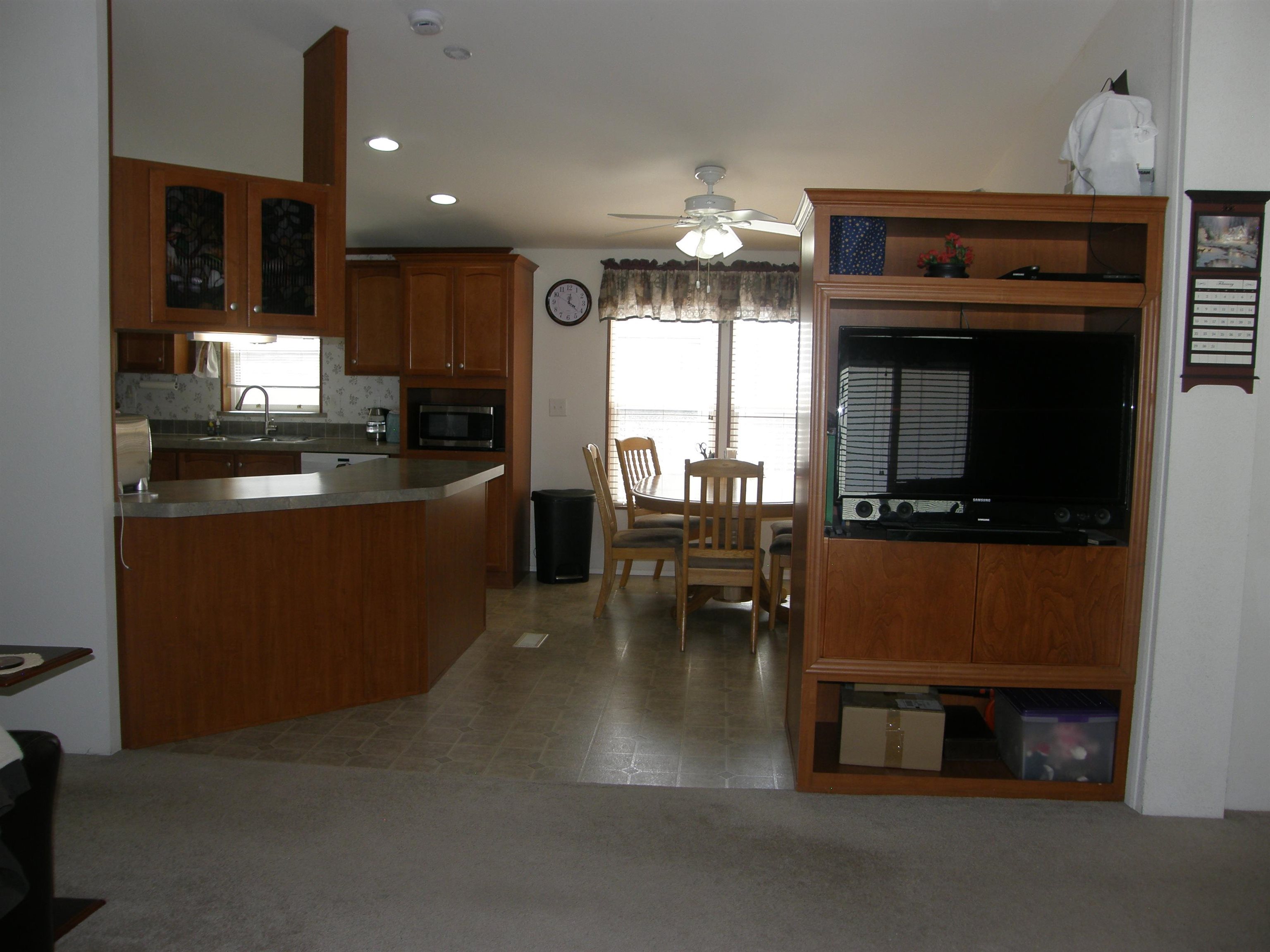 435 32 Road, Unit 262 Clifton, CO 81520 - Photo 15 of 42 a kitchen with sink cabinets and window
