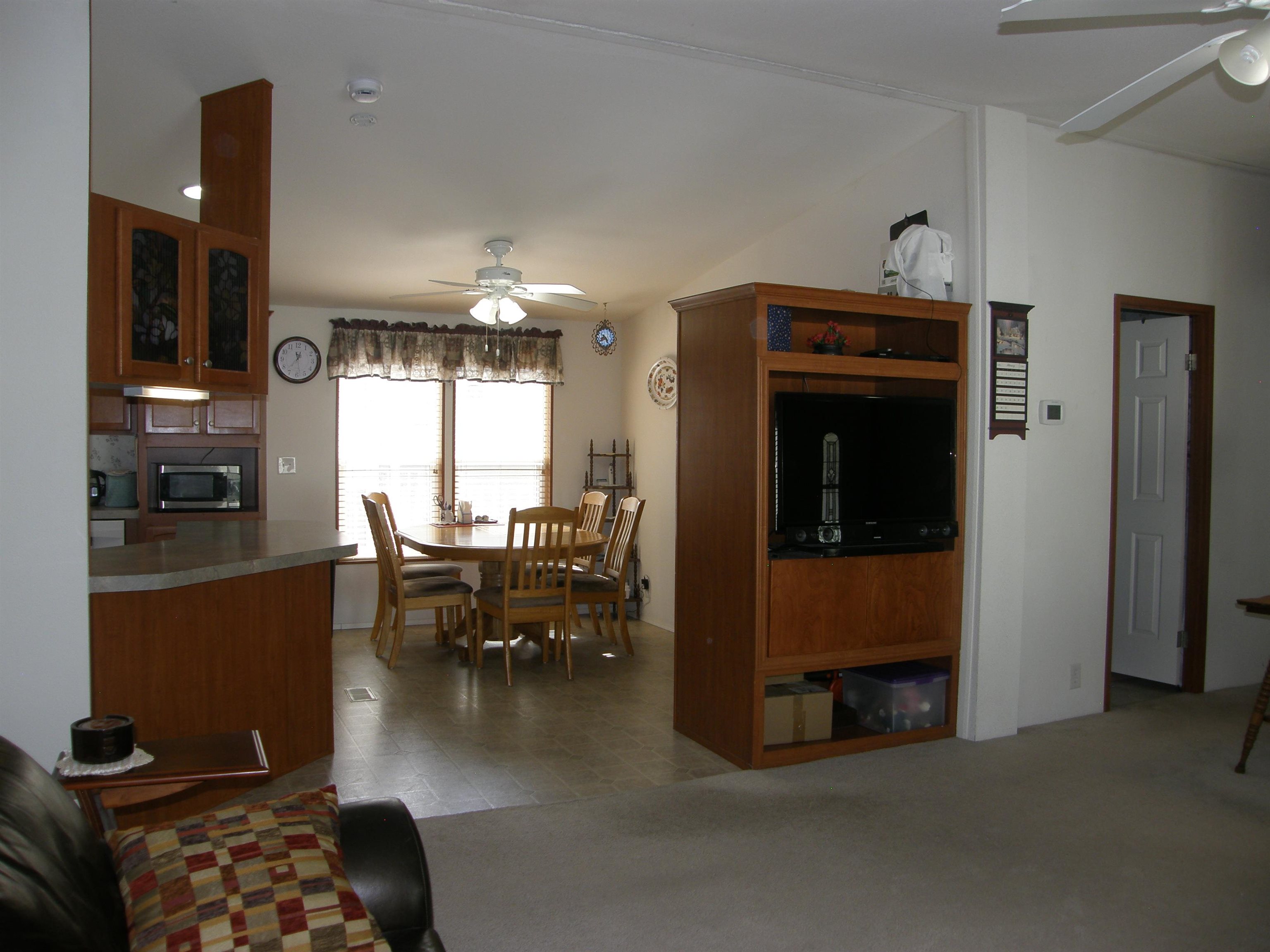 435 32 Road, Unit 262 Clifton, CO 81520 - Photo 16 of 42 a living room with furniture and a fireplace