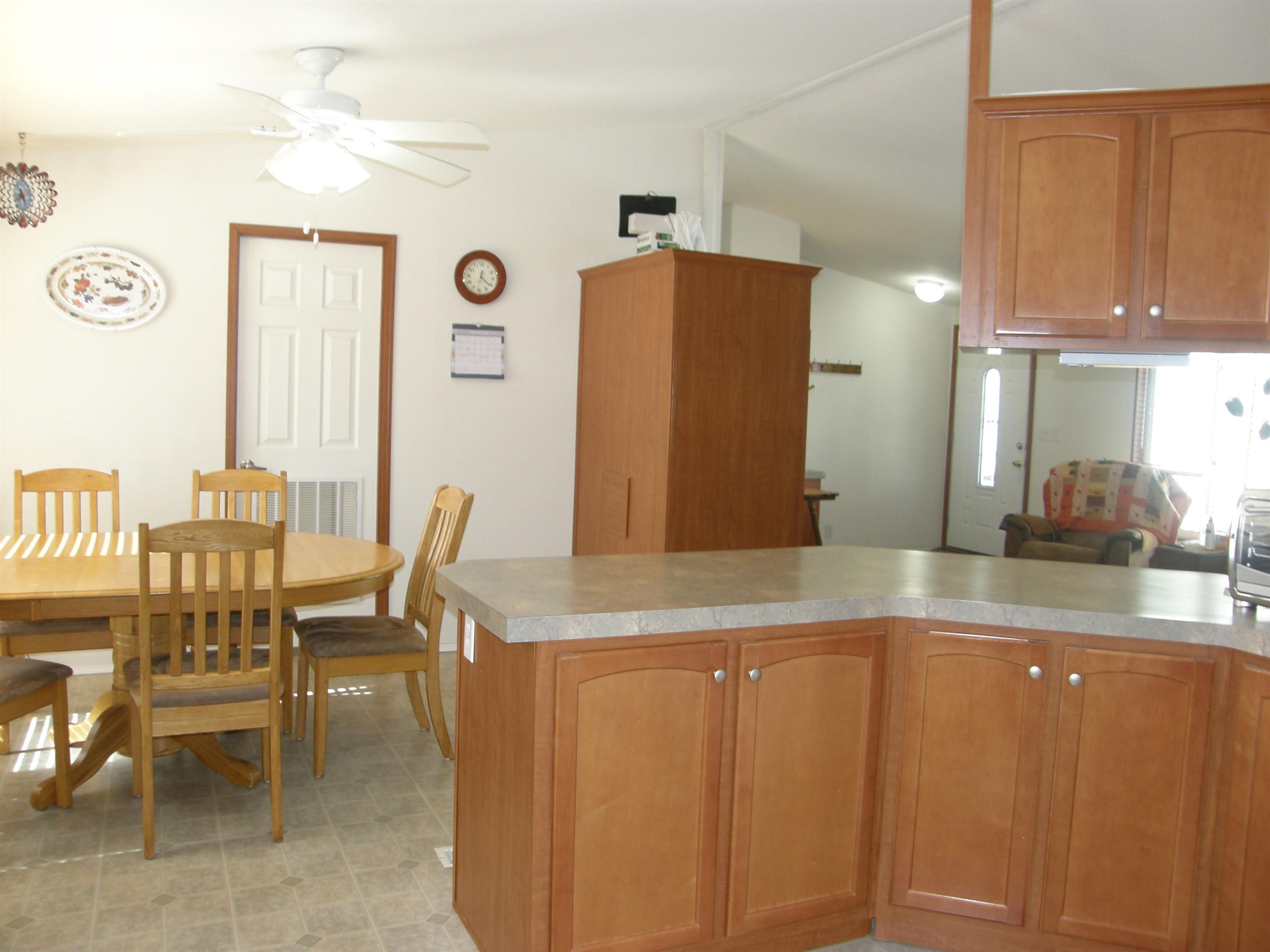435 32 Road, Unit 262 Clifton, CO 81520 - Photo 21 of 42 a living room with stainless steel appliances granite countertop furniture and a large window