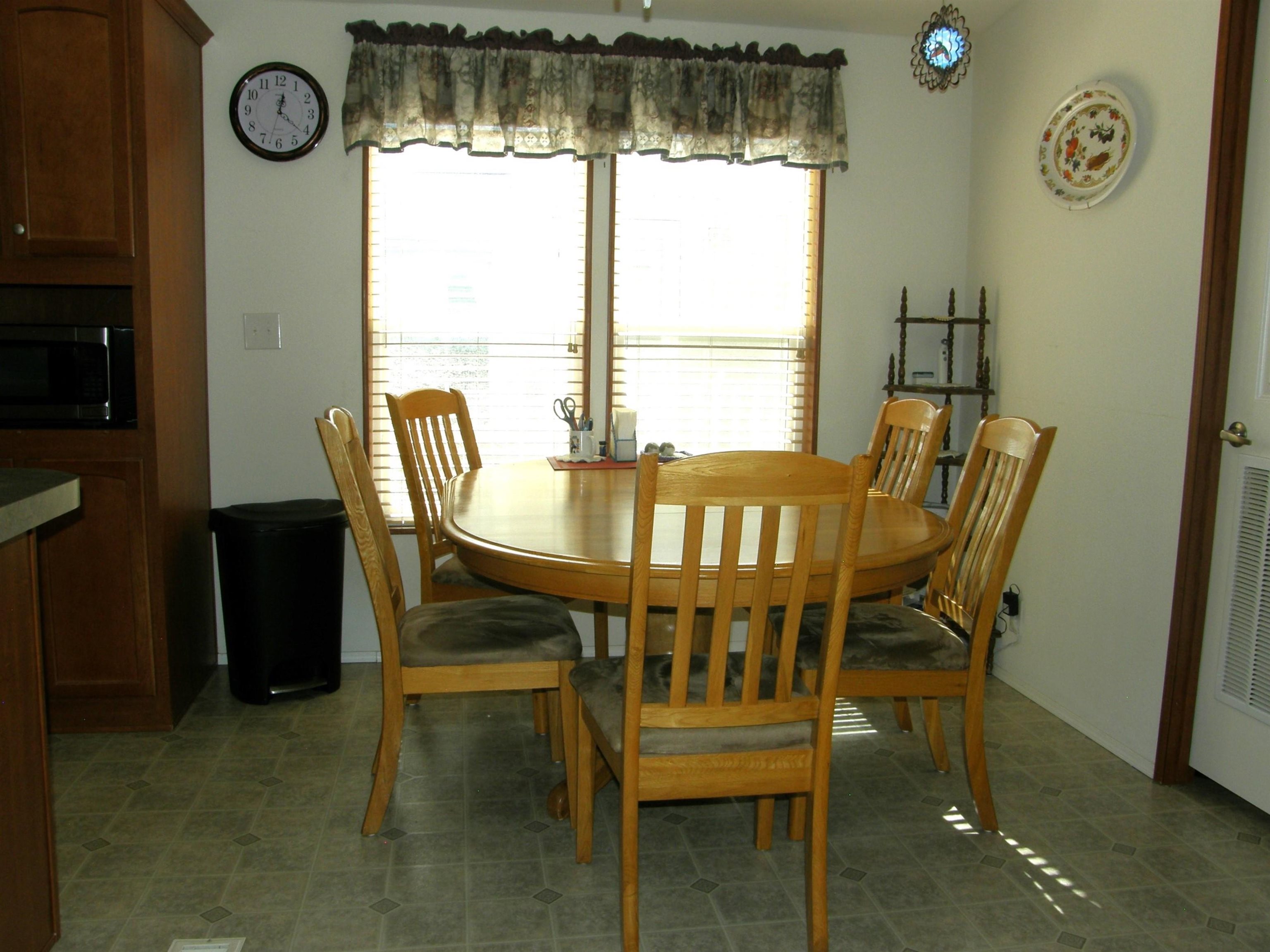 435 32 Road, Unit 262 Clifton, CO 81520 - Photo 23 of 42 a view of a dining room with furniture window and outside view