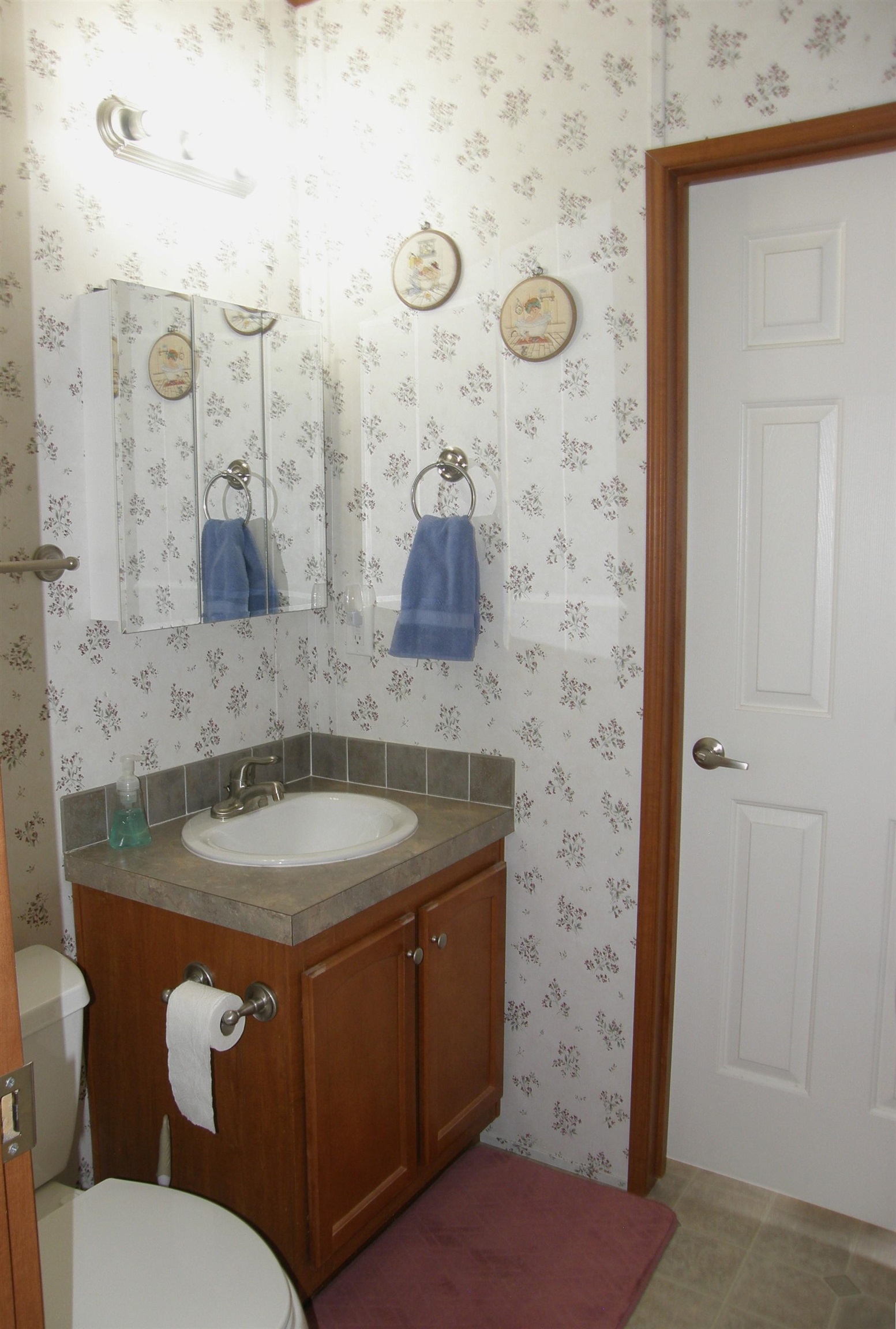 435 32 Road, Unit 262 Clifton, CO 81520 - Photo 35 of 42 a bathroom with a granite countertop sink a toilet and mirror