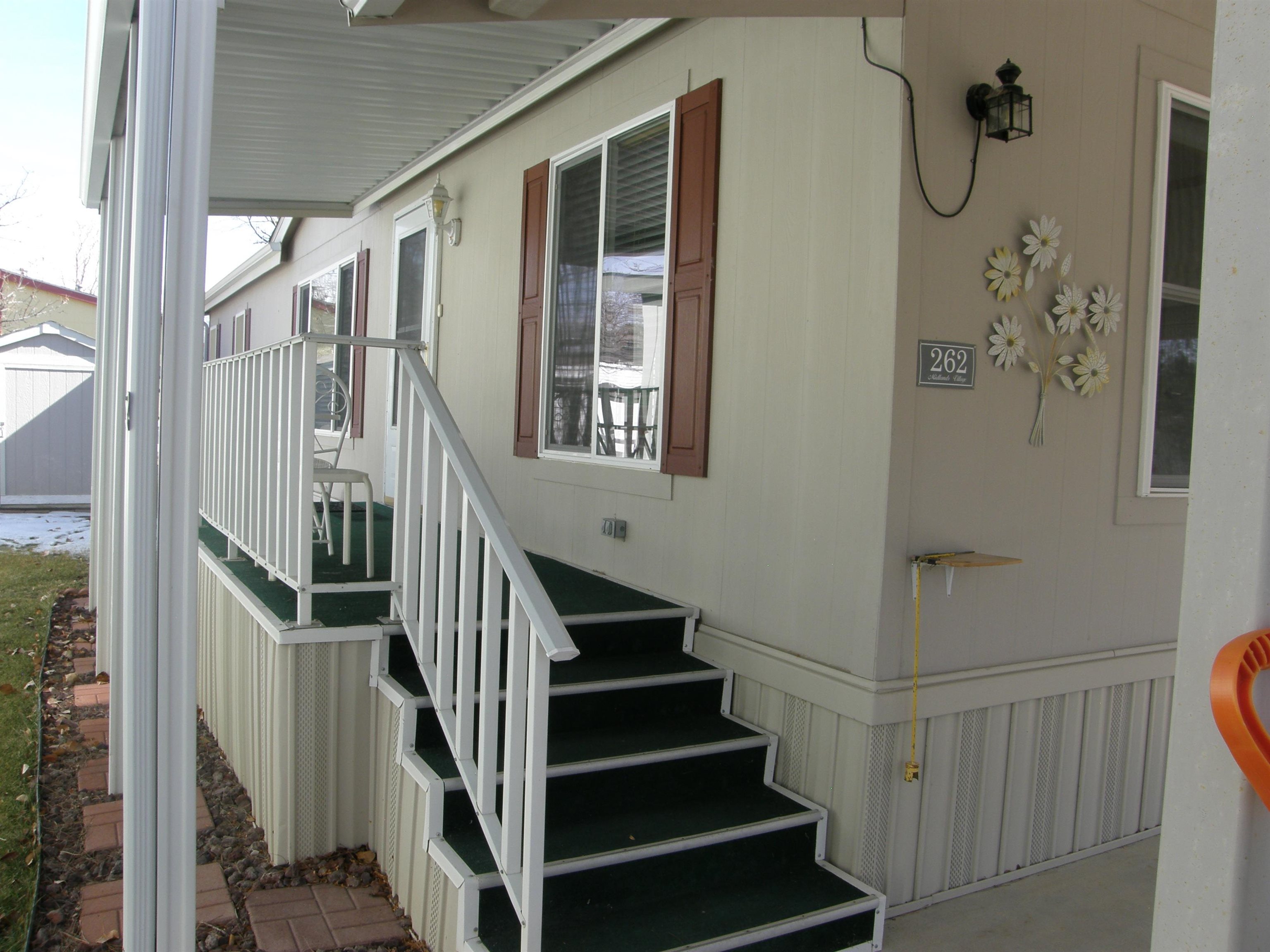 435 32 Road, Unit 262 Clifton, CO 81520 - Photo 4 of 42 a view of staircase with wooden floor and stairs