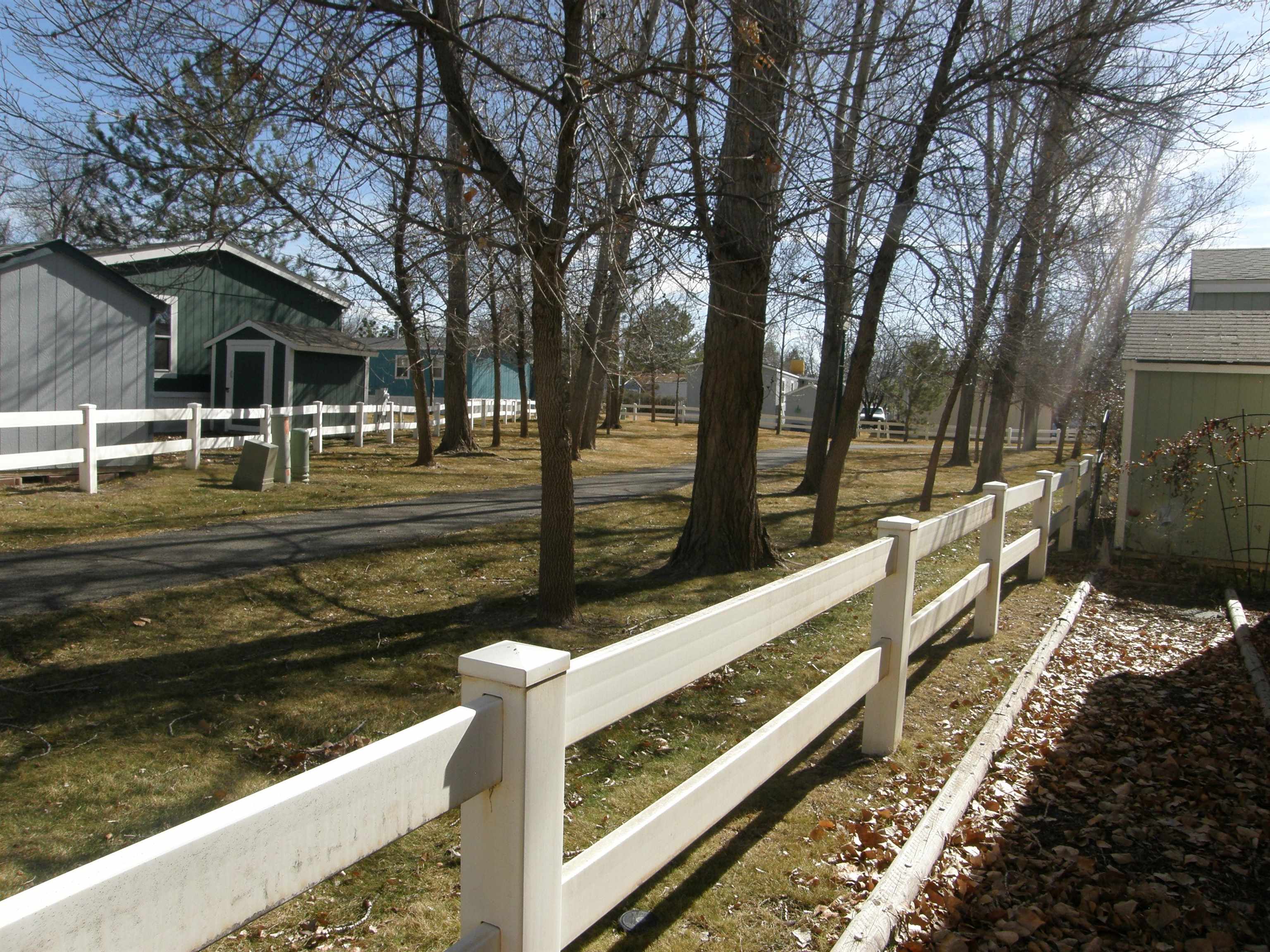435 32 Road, Unit 262 Clifton, CO 81520 - Photo 8 of 42 a view of a wooden deck and trees