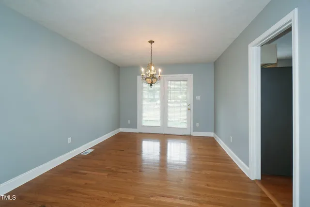 a living room with furniture fireplace and flat screen tv