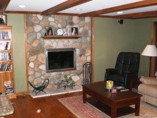 300 Pine Tree Road Lake Orion, MI 48362 - Photo 6 of 13 STONE FIREPLACE IN GREAT ROOM