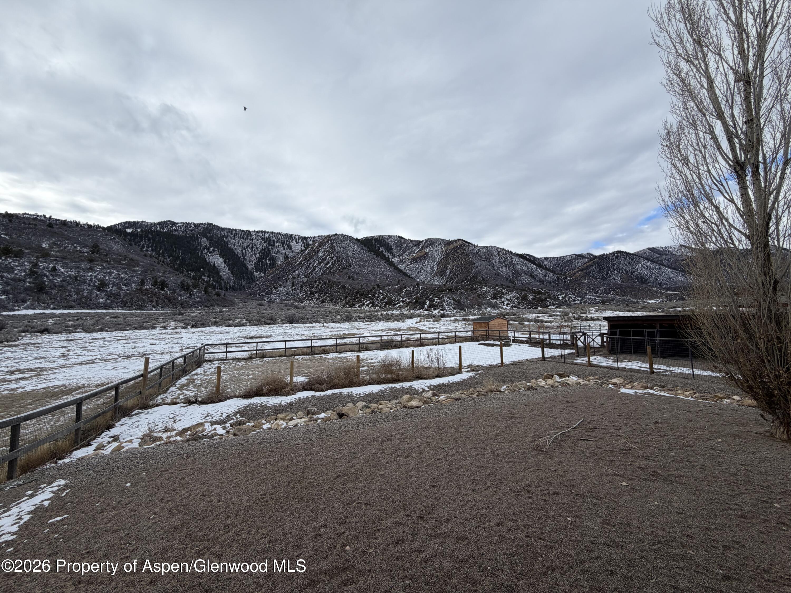 219 Big Dog Road Rifle, CO 81650 - Photo 11 of 11 a view of a swimming pool with a yard
