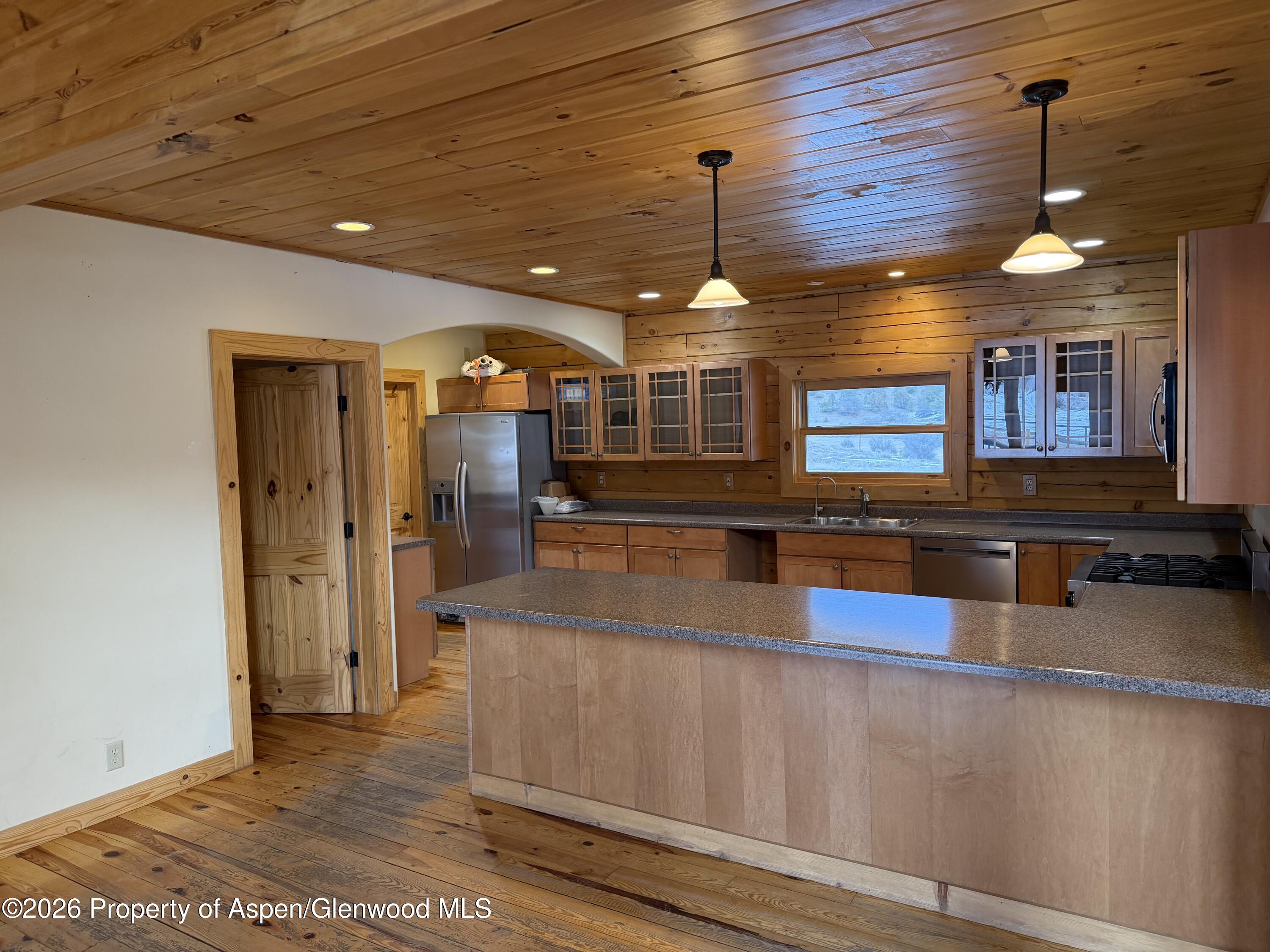 219 Big Dog Road Rifle, CO 81650 - Photo 4 of 11 a view of a kitchen with a window