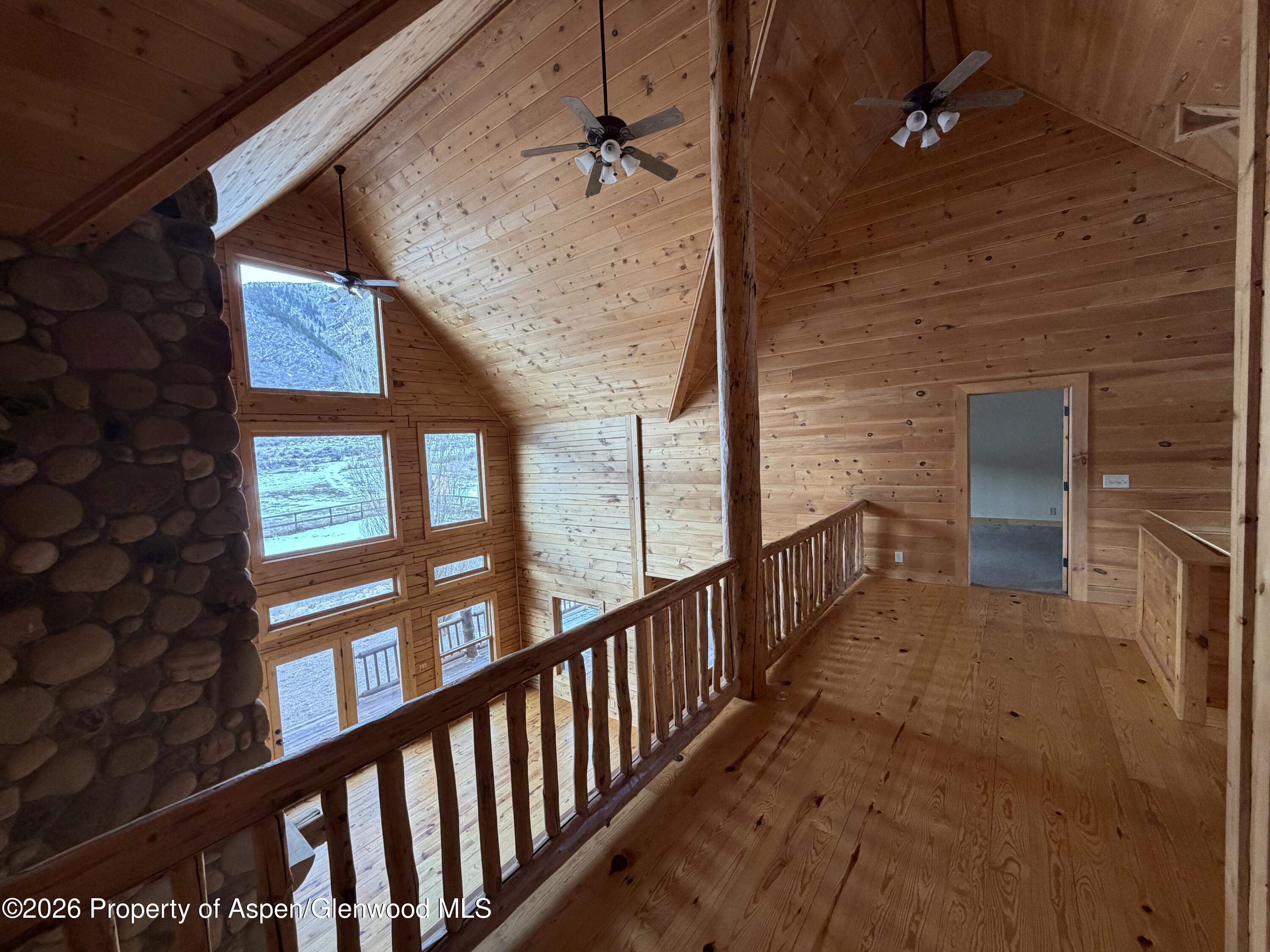219 Big Dog Road Rifle, CO 81650 - Photo 6 of 11 a view of balcony with wooden floor