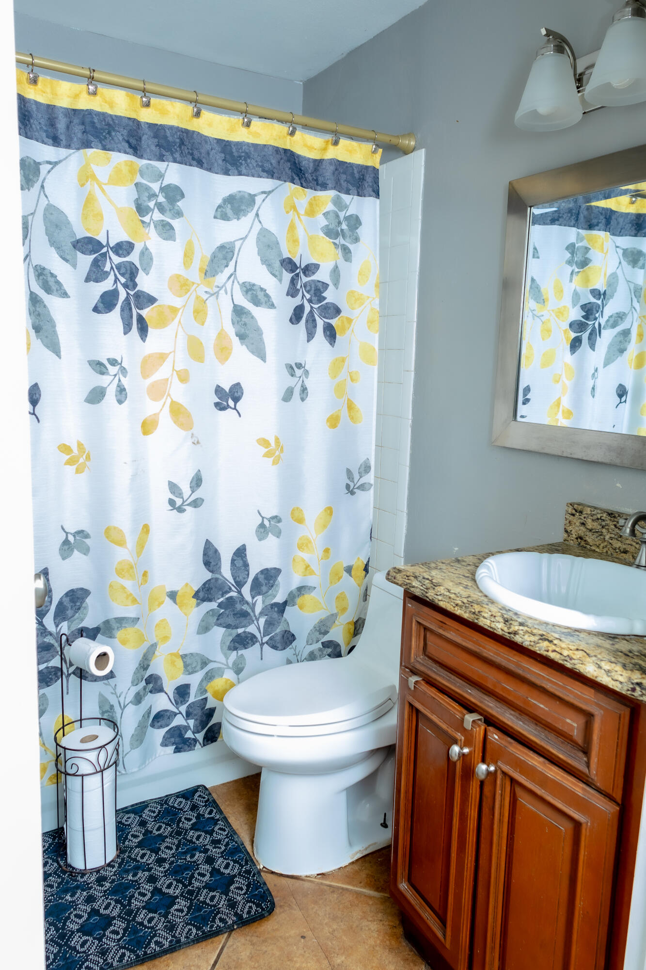 464 Emerald Cove Loop Lakeland, FL 33813 - Photo 19 of 25 a bathroom with a granite countertop sink and a toilet