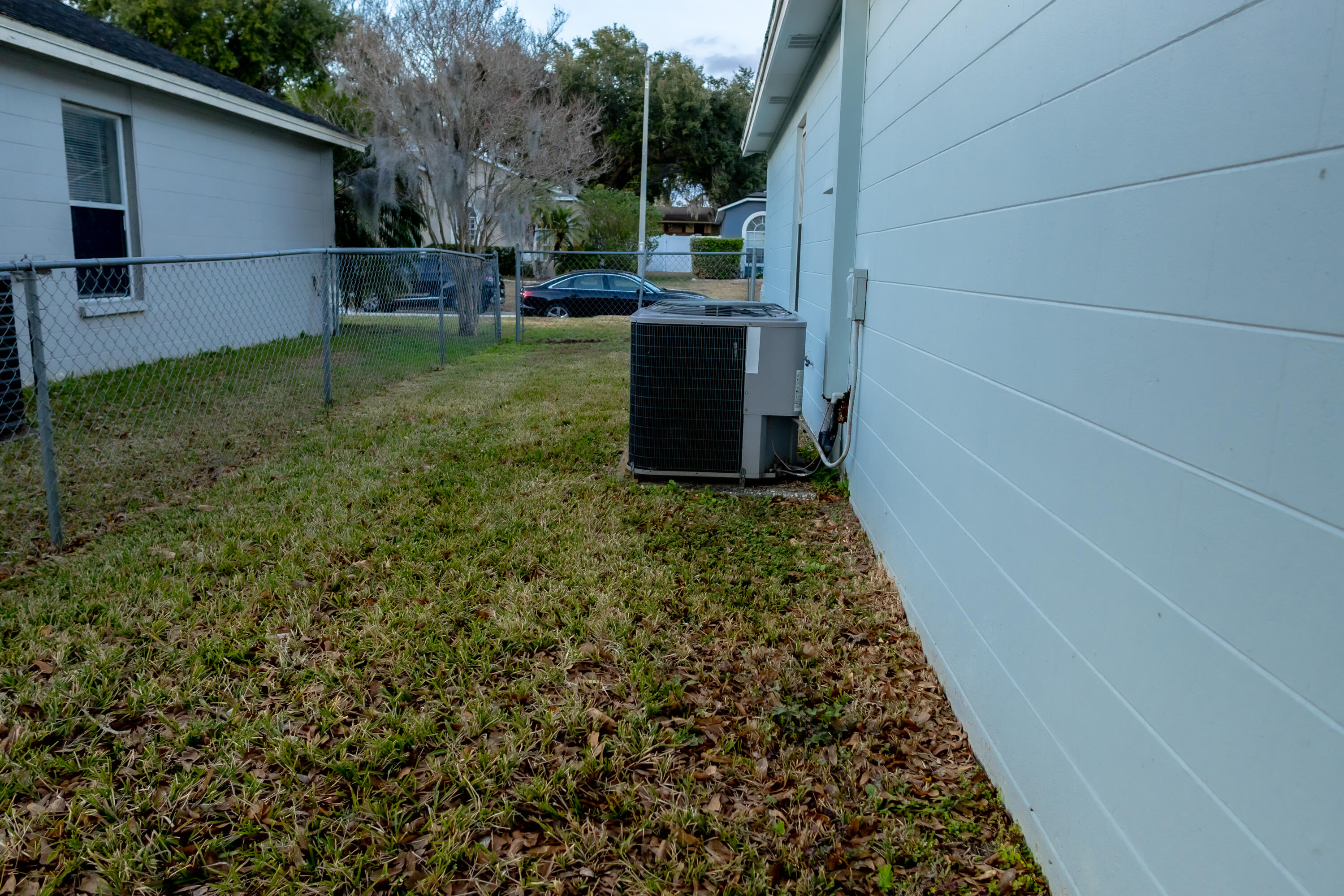 464 Emerald Cove Loop Lakeland, FL 33813 - Photo 20 of 25 a view of a backyard