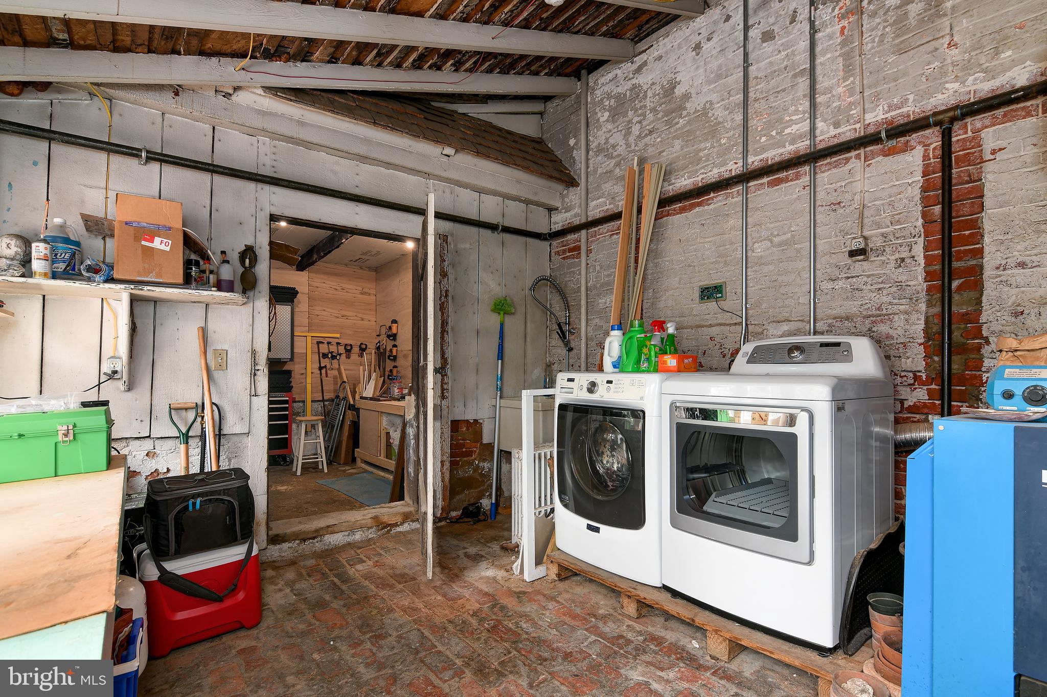 207 High Street Cambridge, MD 21613 - Photo 29 of 44 Brick Floored Utility Room