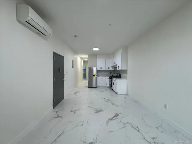 a view of a kitchen with a sink