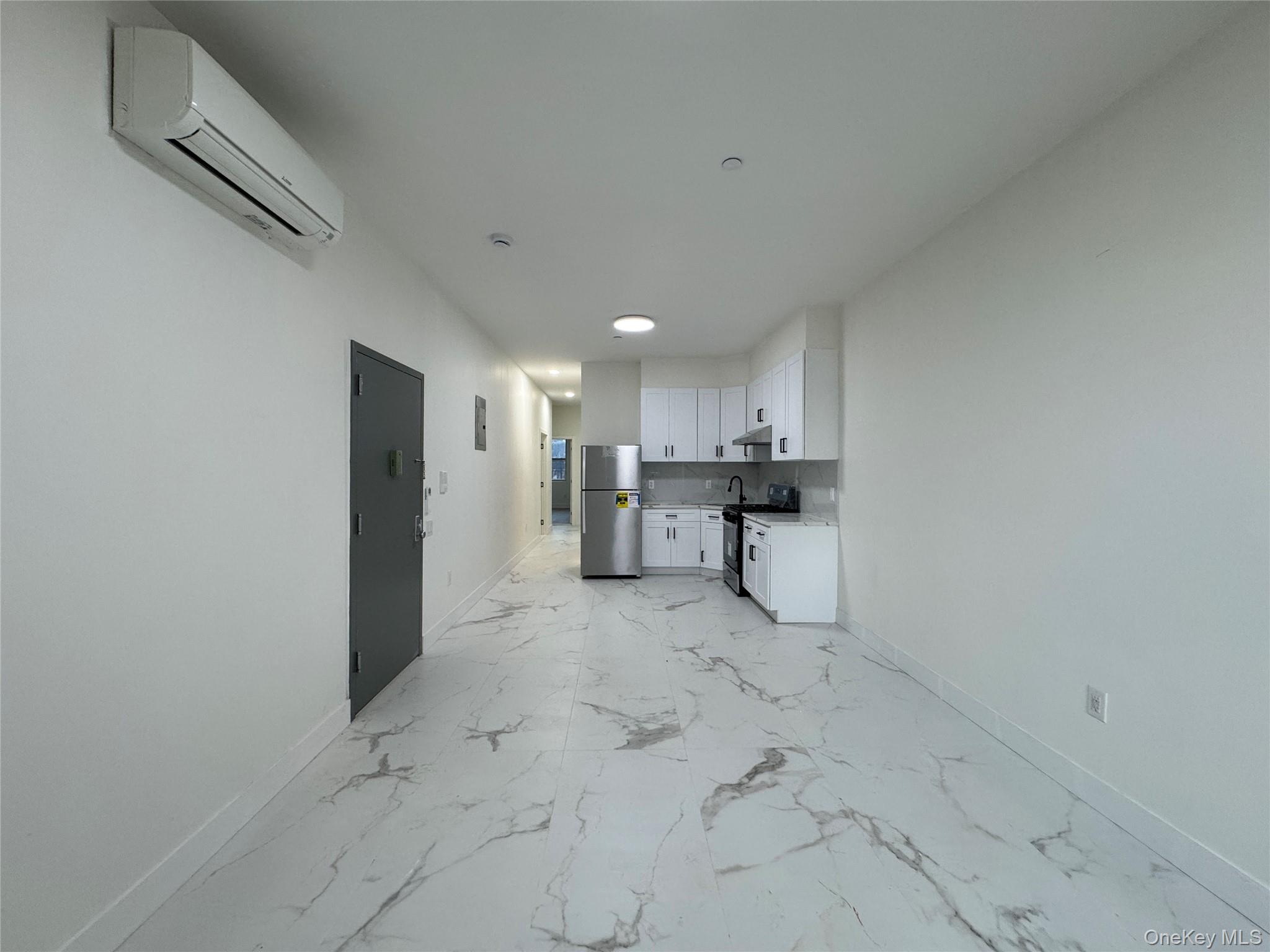 101-12 Martense Avenue Queens, NY 11368 - Photo 3 of 8 a view of a kitchen with a sink