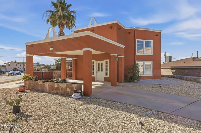 a front view of a house with a porch