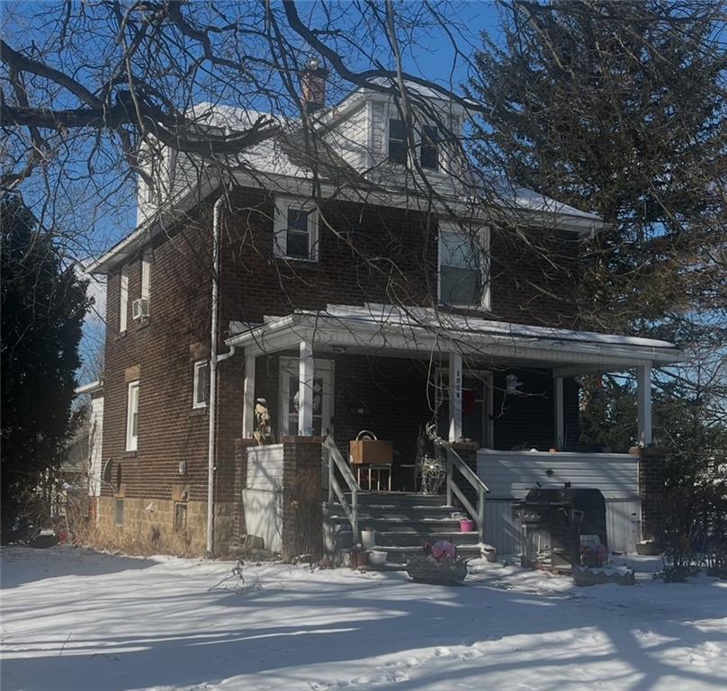 1008 Baldwin Avenue Sharon, PA 16146 - Photo 2 of 2 a view of a building with a tree