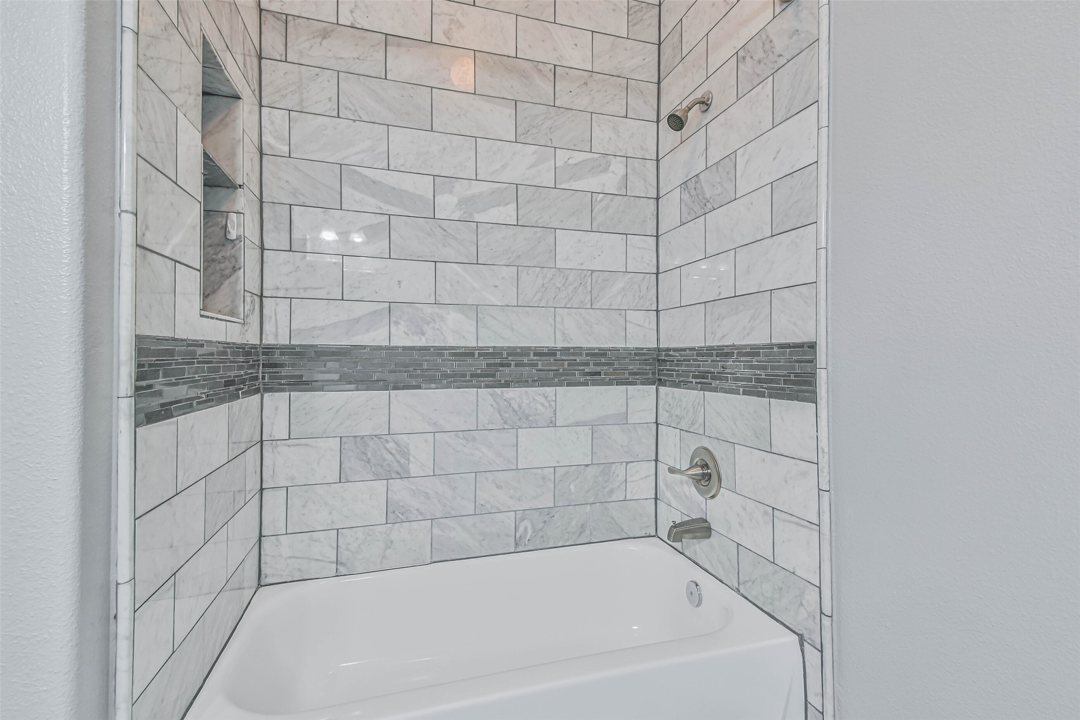 20942 Wind Field Lane Spring, TX 77379 - Photo 37 of 46 a bathroom with a bathtub