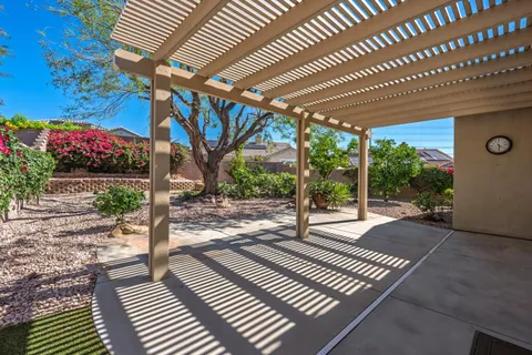 front view of a house with a garden