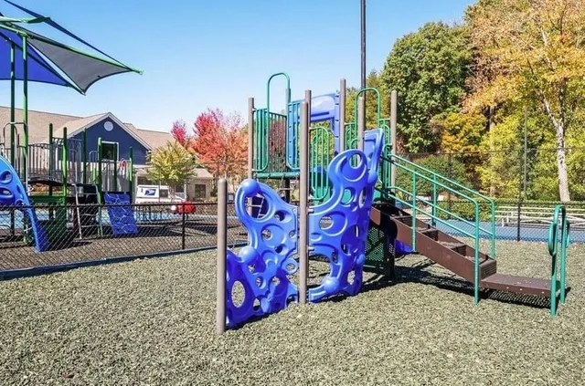 a view of outdoor space with table and chairs
