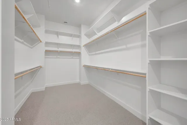 a bathroom with a bathtub sink and mirror