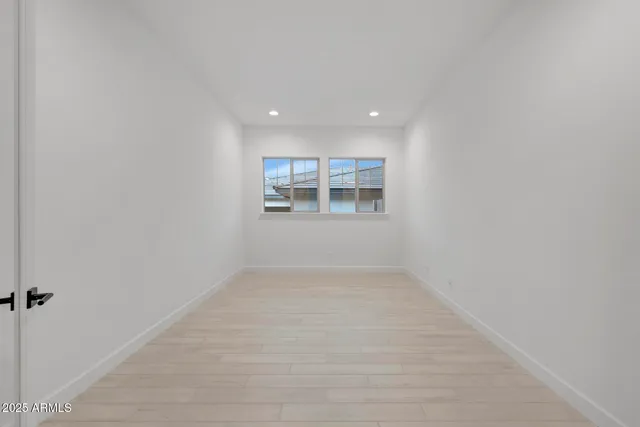 an empty room with windows