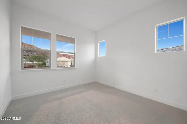 a bathroom with a toilet sink and shower