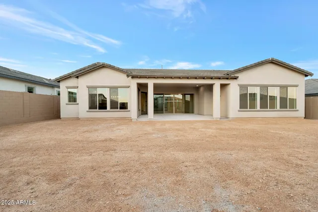 a view of a field with an ocean
