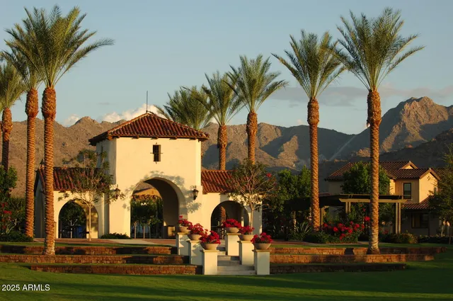 a view of outdoor space with swimming pool and trees in the background