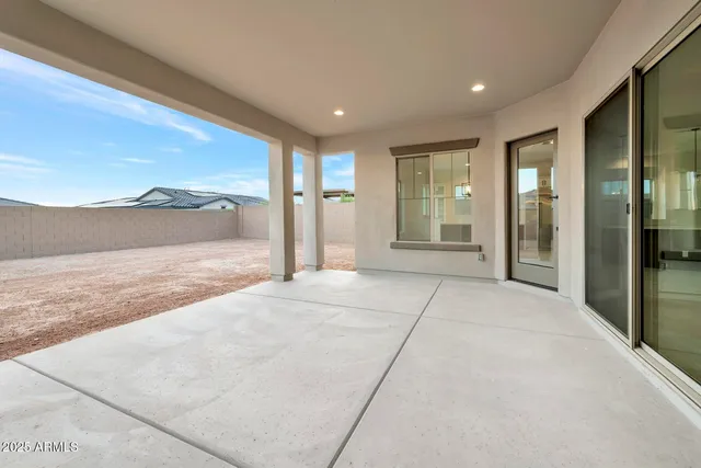 a view of a town with mountains in the background