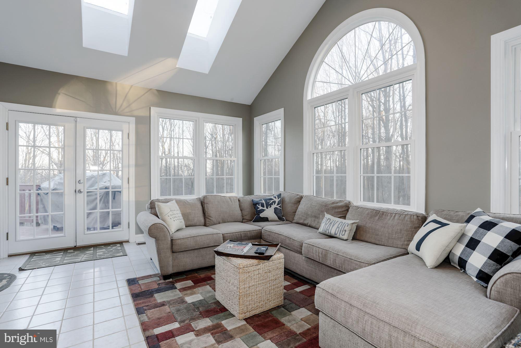 7163 Baldwin Ridge Road Warrenton, VA 20187 - Photo 11 of 35 Light & Bright Sunroom w/French Doors open to Deck