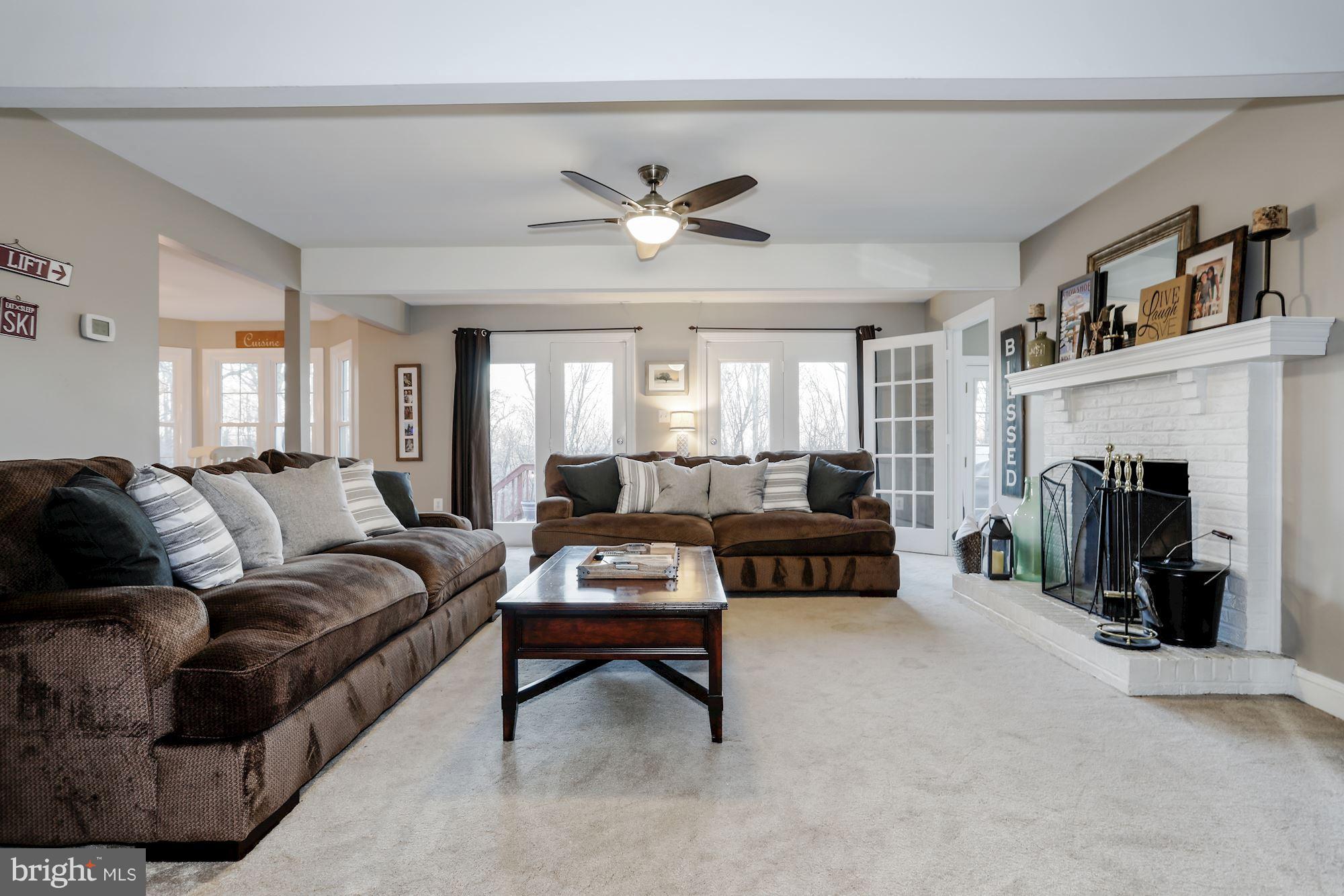 7163 Baldwin Ridge Road Warrenton, VA 20187 - Photo 13 of 35 Family Room has French Doors open to Deck