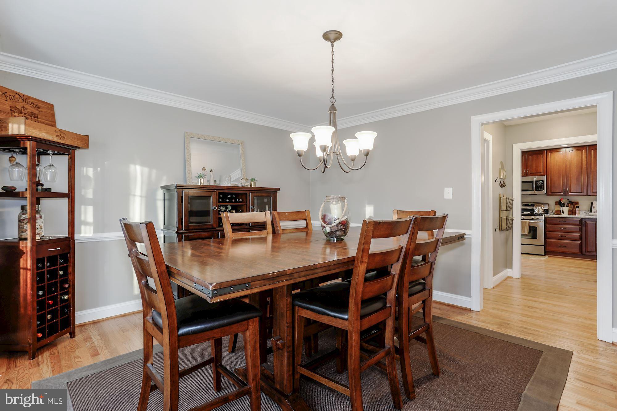 7163 Baldwin Ridge Road Warrenton, VA 20187 - Photo 3 of 35 Dining Room with Crown Molding and Chair Rail