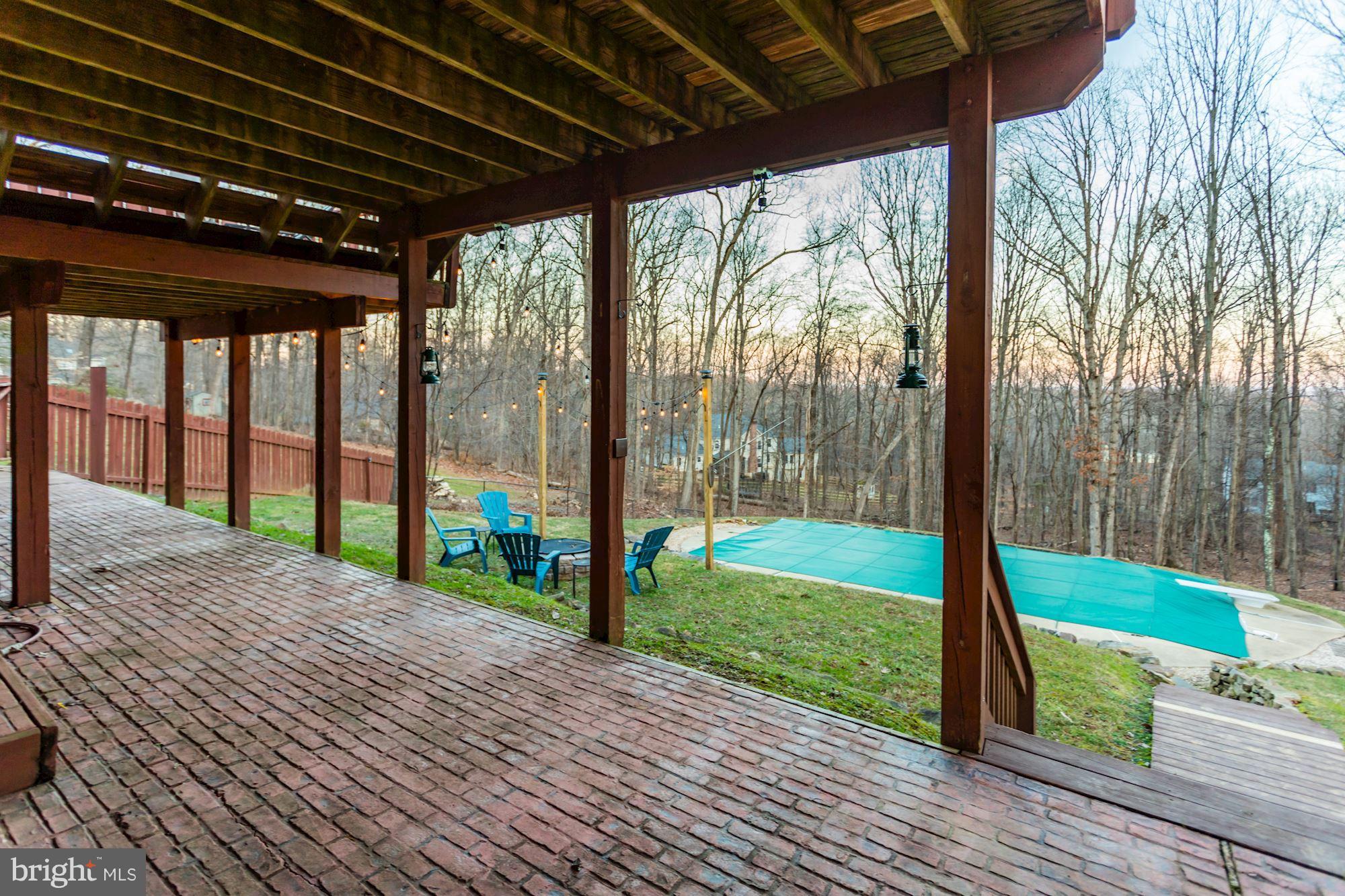 7163 Baldwin Ridge Road Warrenton, VA 20187 - Photo 32 of 35 Patio Under Deck and walk out from Basement