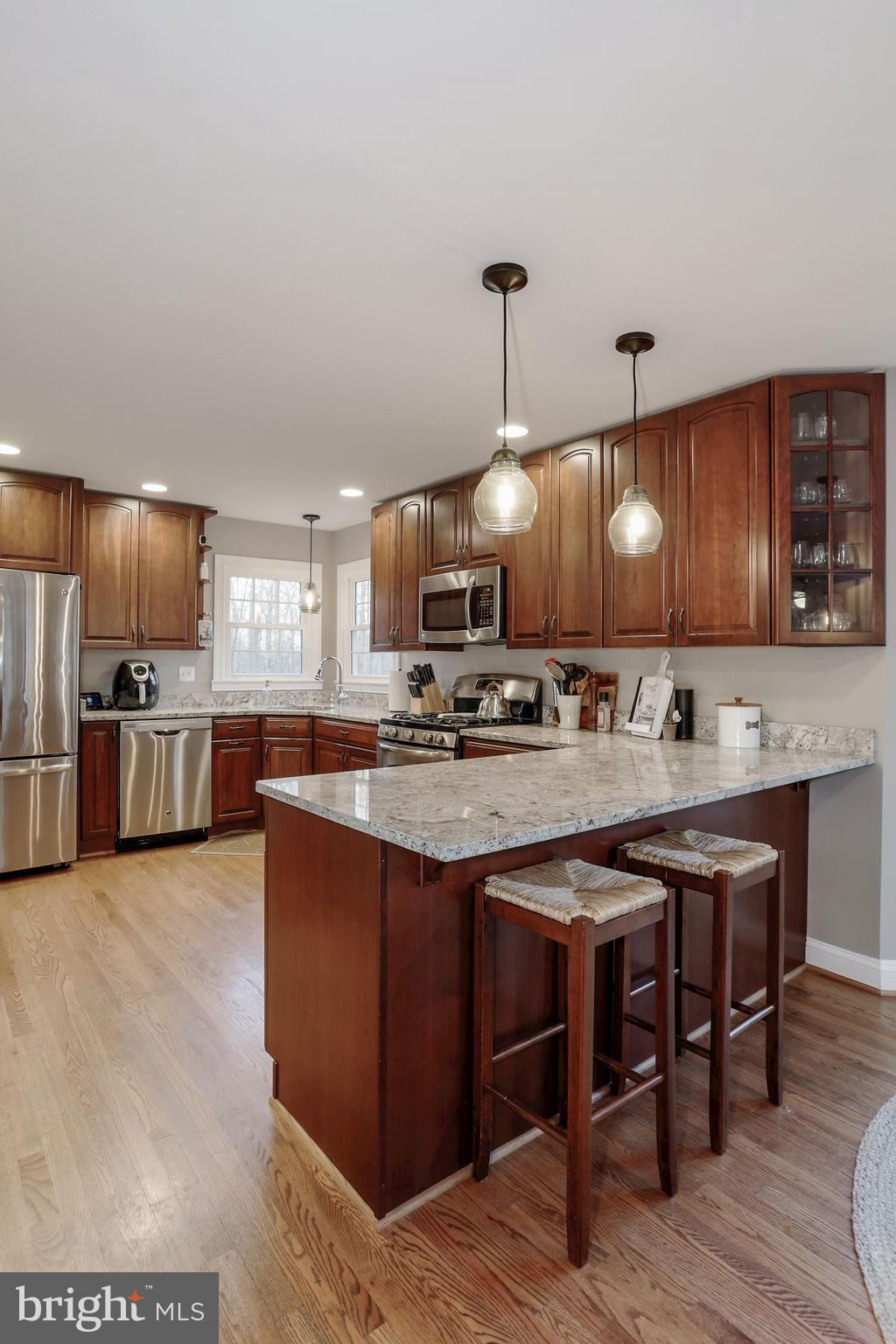 7163 Baldwin Ridge Road Warrenton, VA 20187 - Photo 9 of 35 Beautiful Hardwood Floors in Kitchen