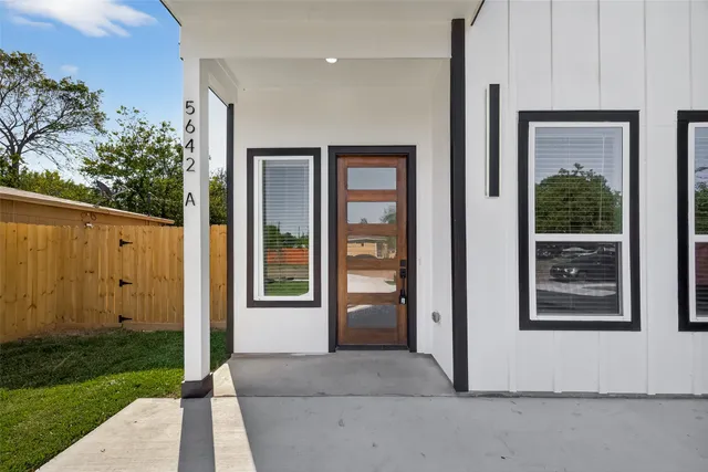 a front view of a house with a porch
