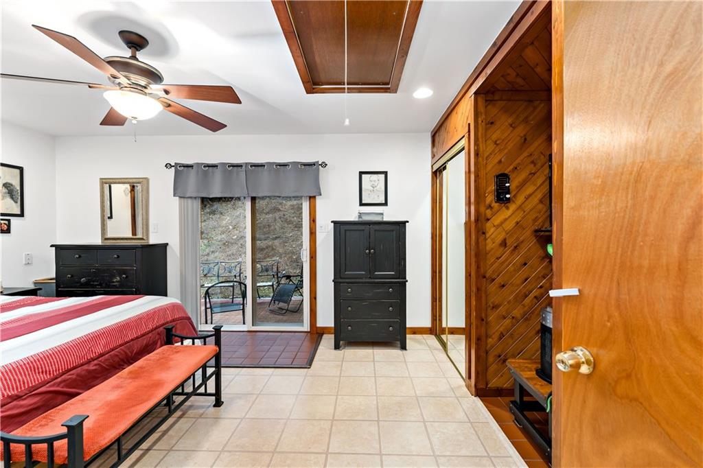 3354 Millers Run Road Cecil, PA 15321 - Photo 14 of 45 a bedroom with a bed and a walk in closet