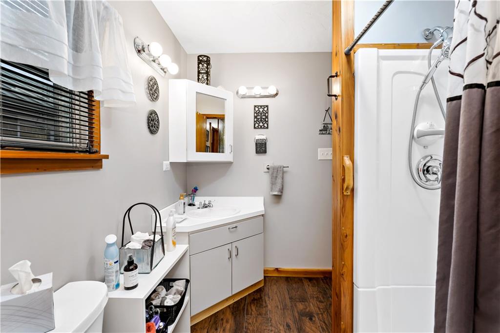 3354 Millers Run Road Cecil, PA 15321 - Photo 16 of 45 a bathroom with a sink a mirror and shower