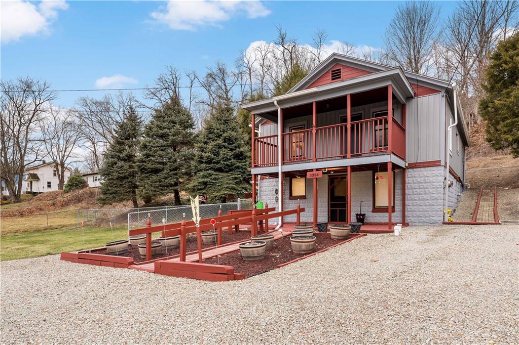 3354 Millers Run Road Cecil, PA 15321 - Photo 2 of 45 a front view of a house with a yard