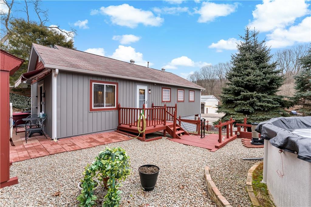 3354 Millers Run Road Cecil, PA 15321 - Photo 31 of 45 a view of a house with backyard and sitting area