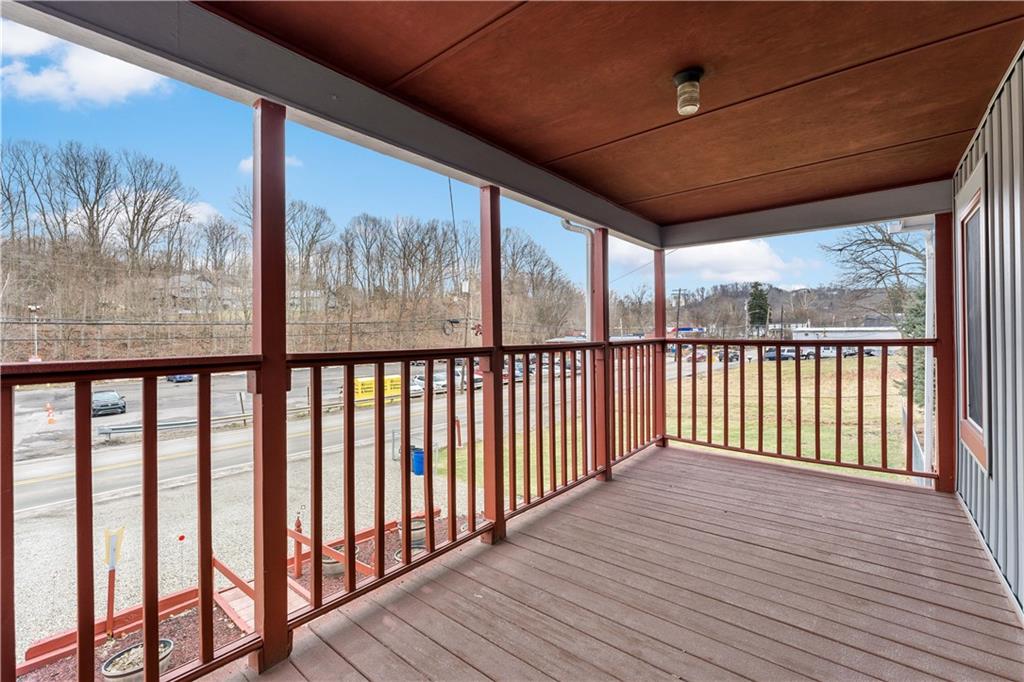 3354 Millers Run Road Cecil, PA 15321 - Photo 32 of 45 a view of a porch with wooden floor of the house