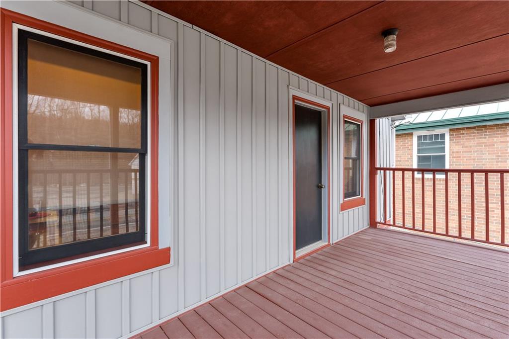 3354 Millers Run Road Cecil, PA 15321 - Photo 33 of 45 a view of a porch with wooden floor and a window