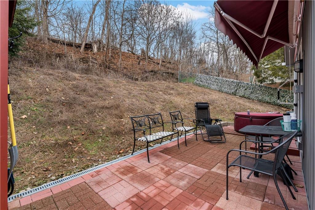 3354 Millers Run Road Cecil, PA 15321 - Photo 36 of 45 a view of backyard with seating space and trees