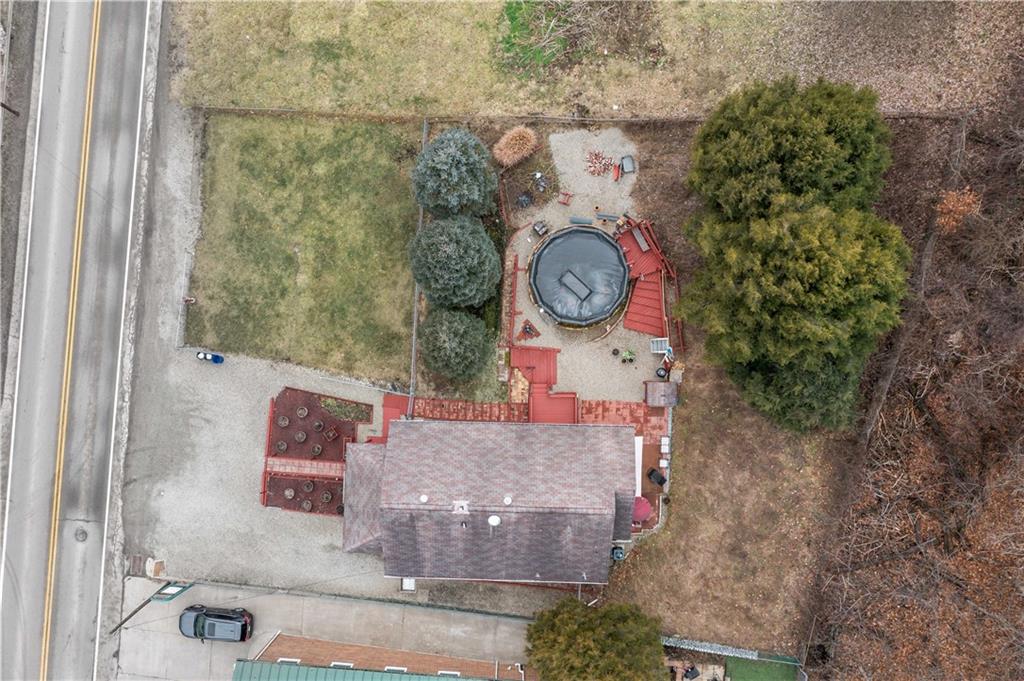 3354 Millers Run Road Cecil, PA 15321 - Photo 39 of 45 a bathroom with a toilet and a shower curtain