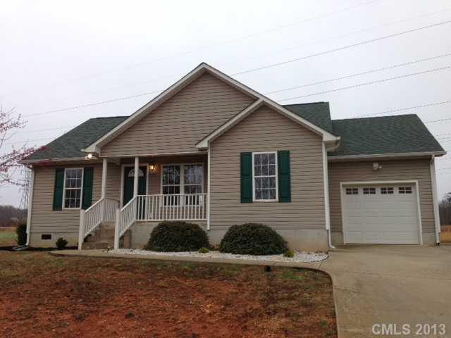 115 North Castleview Road Salisbury, NC 28146 - Photo 1 of 12 a front view of a house with garage