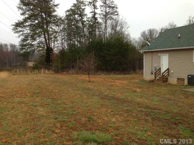 115 North Castleview Road Salisbury, NC 28146 - Photo 12 of 12 a backyard of a house with lots of green space