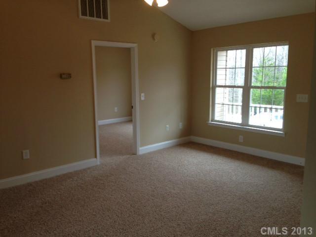 115 North Castleview Road Salisbury, NC 28146 - Photo 6 of 12 an empty room that has a window