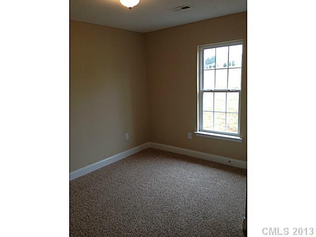 115 North Castleview Road Salisbury, NC 28146 - Photo 10 of 12 a view of an empty room with a window