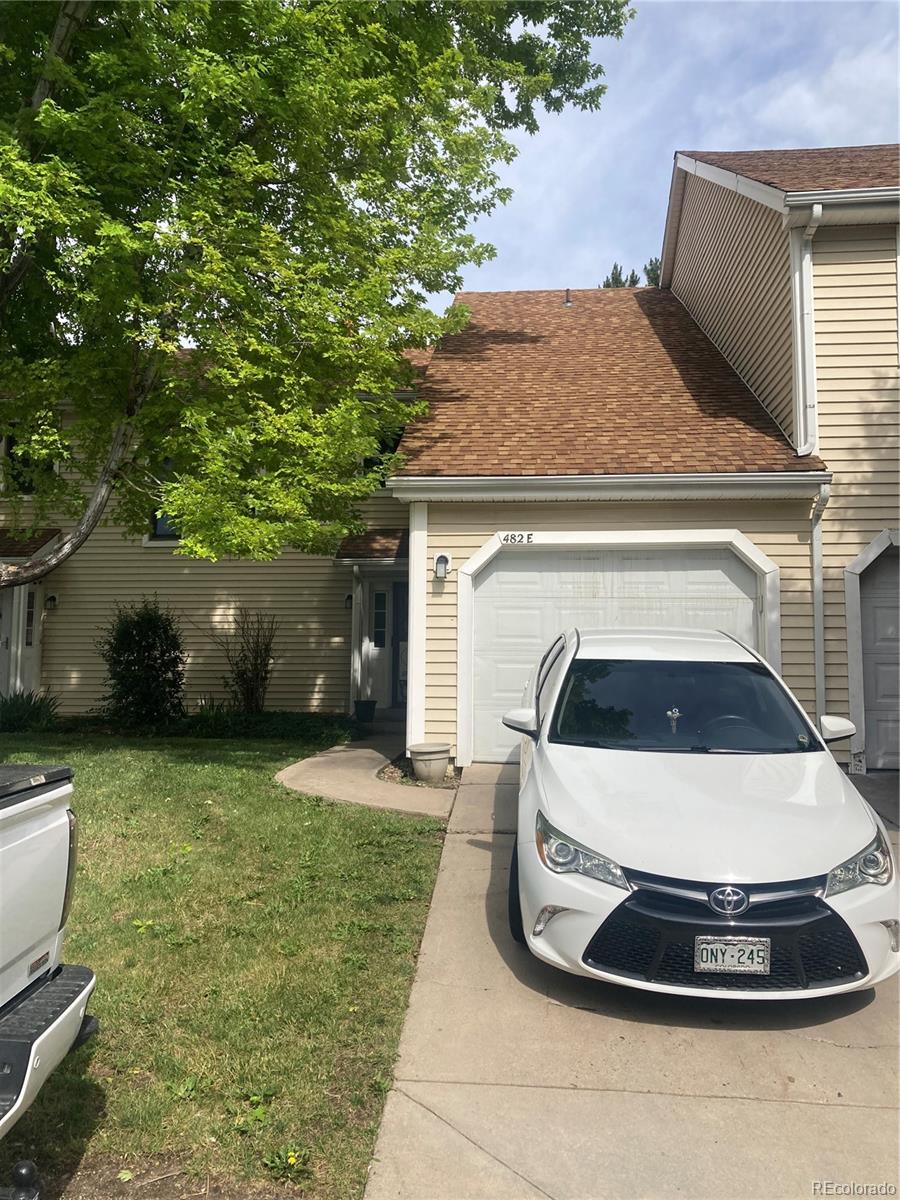 a view of a back yard of the house