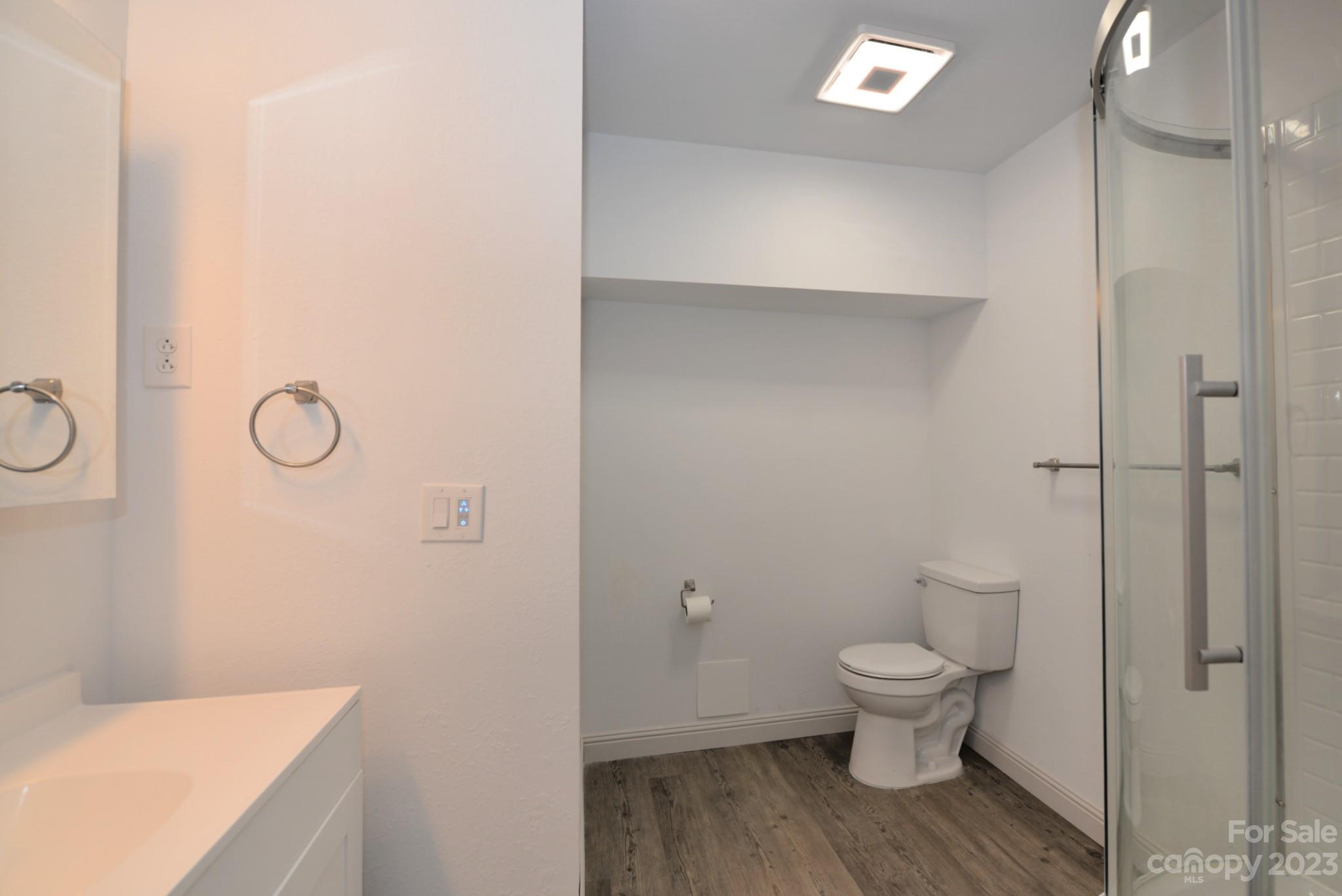 99 Bayside Drive Sylva, NC 28779 - Photo 31 of 34 a bathroom with a toilet and a shower